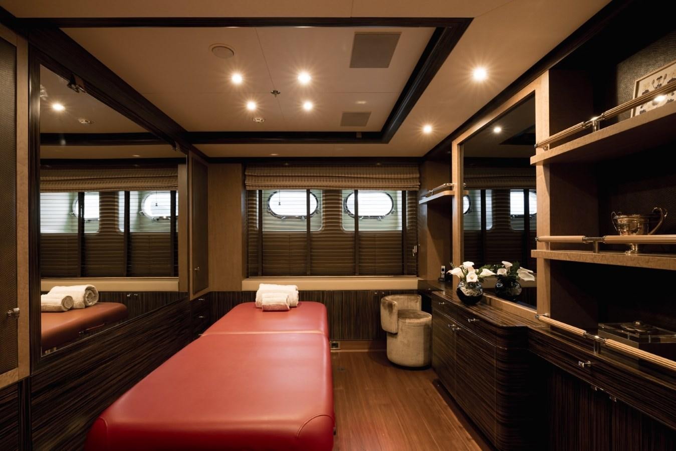 a room with a red bed aboard BELLE ANNA Yacht for Sale