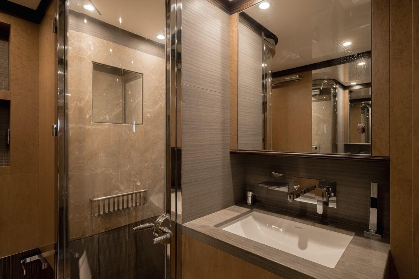 a bathroom with a large mirror aboard BELLE ANNA Yacht for Sale