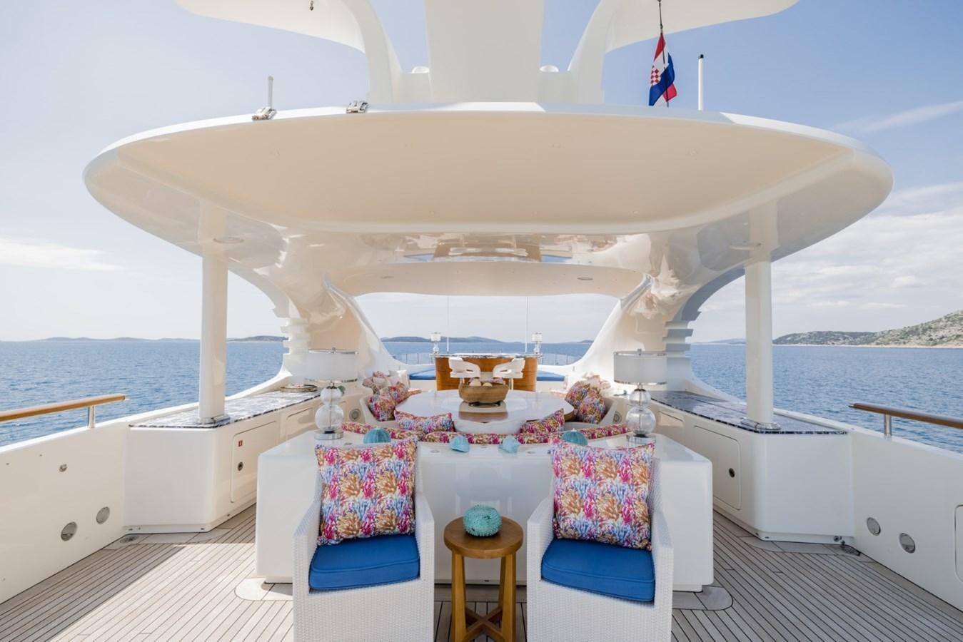 a boat with a canopy aboard BELLE ANNA Yacht for Sale