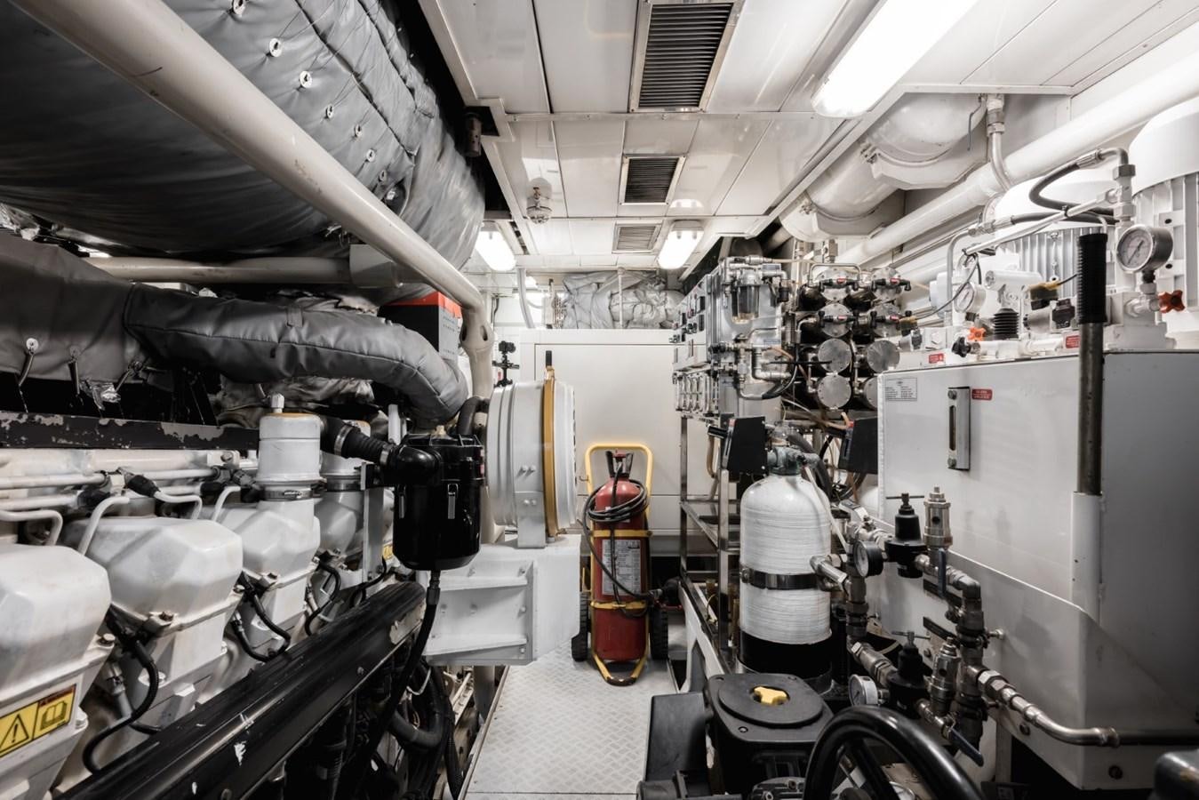 a room with machinery and pipes aboard BELLE ANNA Yacht for Sale