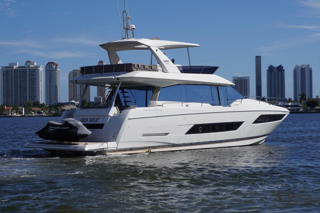 a white yacht on the water aboard 2017 PRESTIGE 680  Yacht for Sale