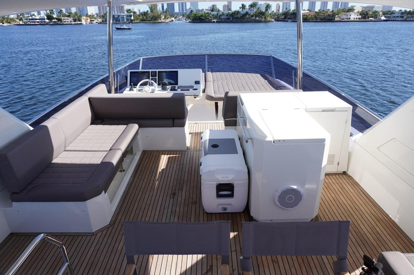 a deck with a deck and chairs on it aboard 2017 PRESTIGE 680  Yacht for Sale