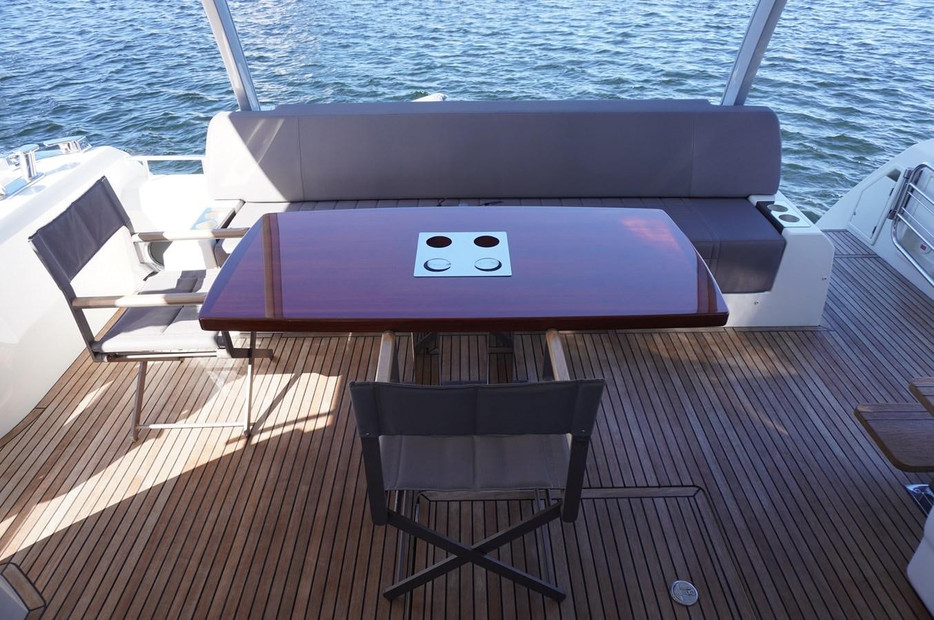 a table on a boat aboard 2017 PRESTIGE 680  Yacht for Sale