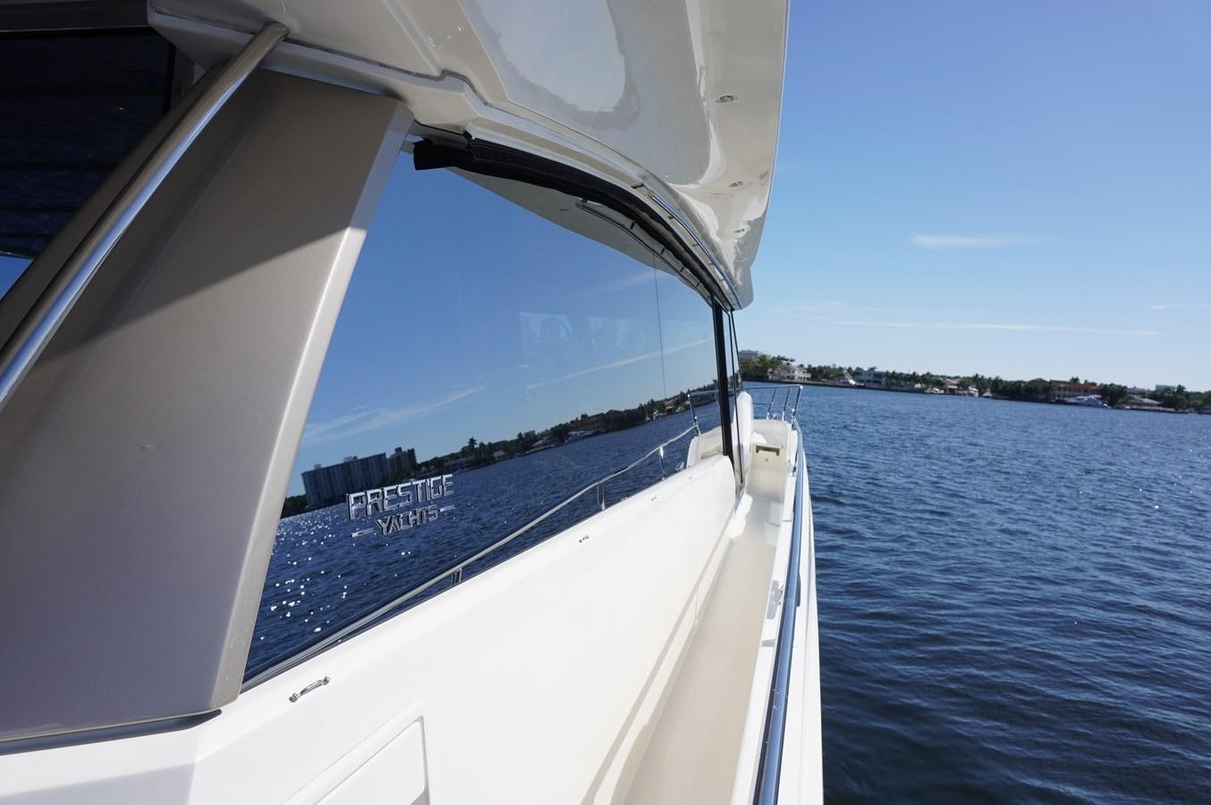 a boat on the water aboard 2017 PRESTIGE 680  Yacht for Sale