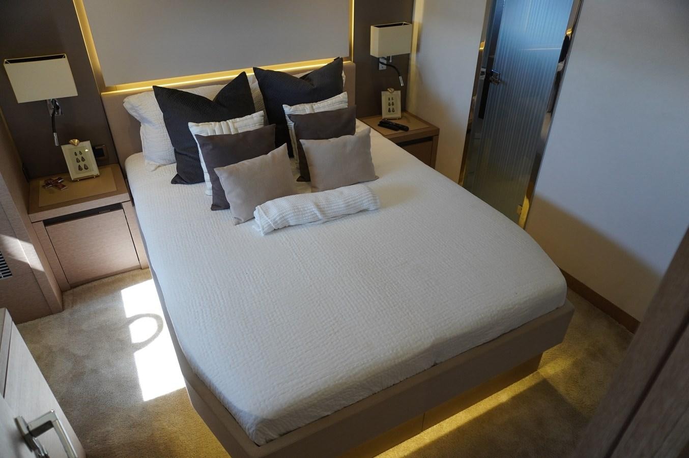a bed with white sheets aboard 2017 PRESTIGE 680  Yacht for Sale