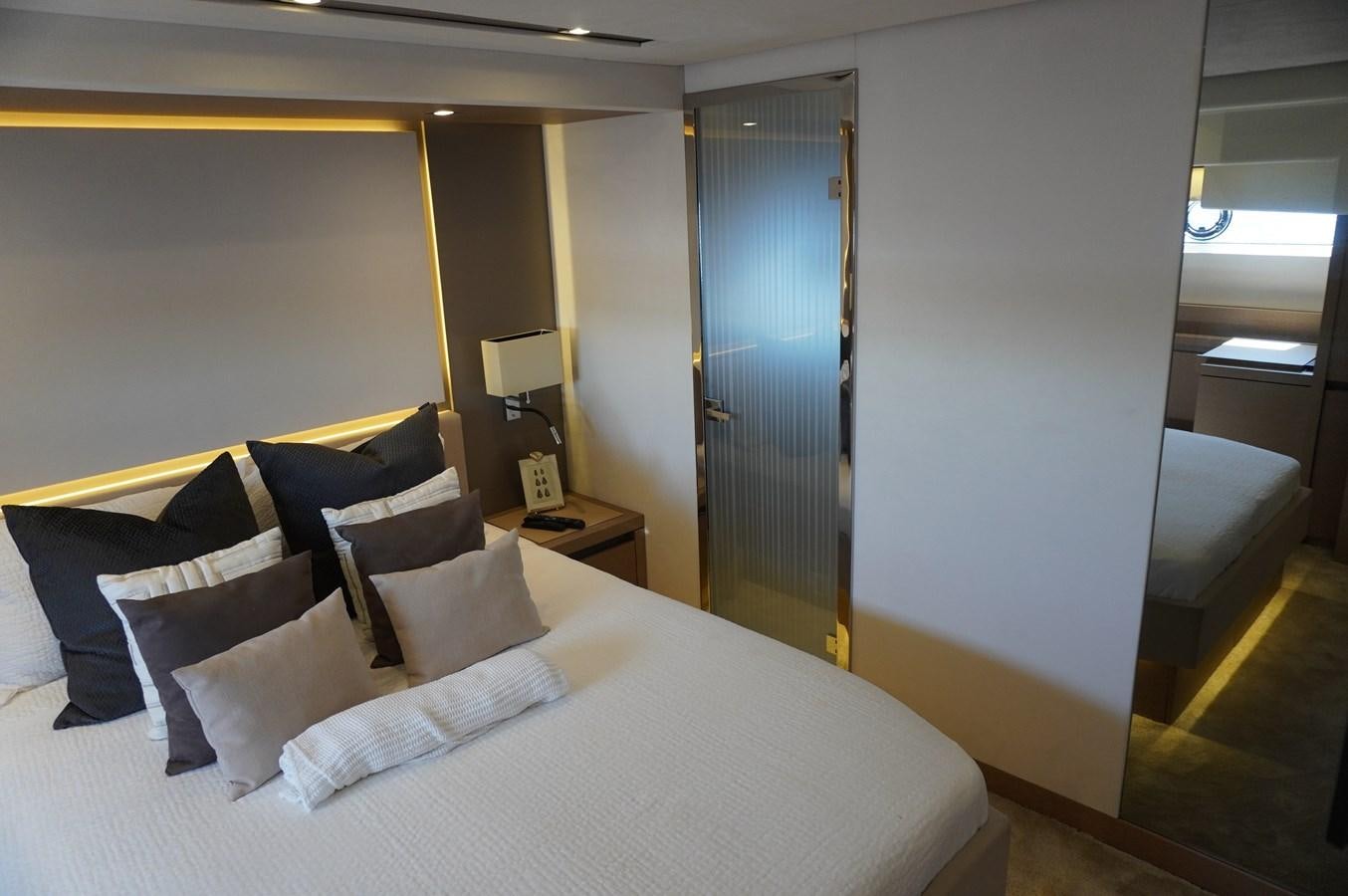 a hotel room with a bed aboard 2017 PRESTIGE 680  Yacht for Sale