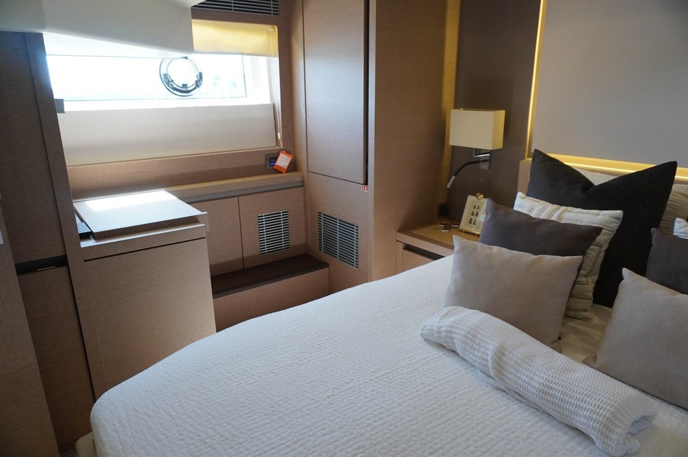 a bed with a white sheet aboard 2017 PRESTIGE 680  Yacht for Sale