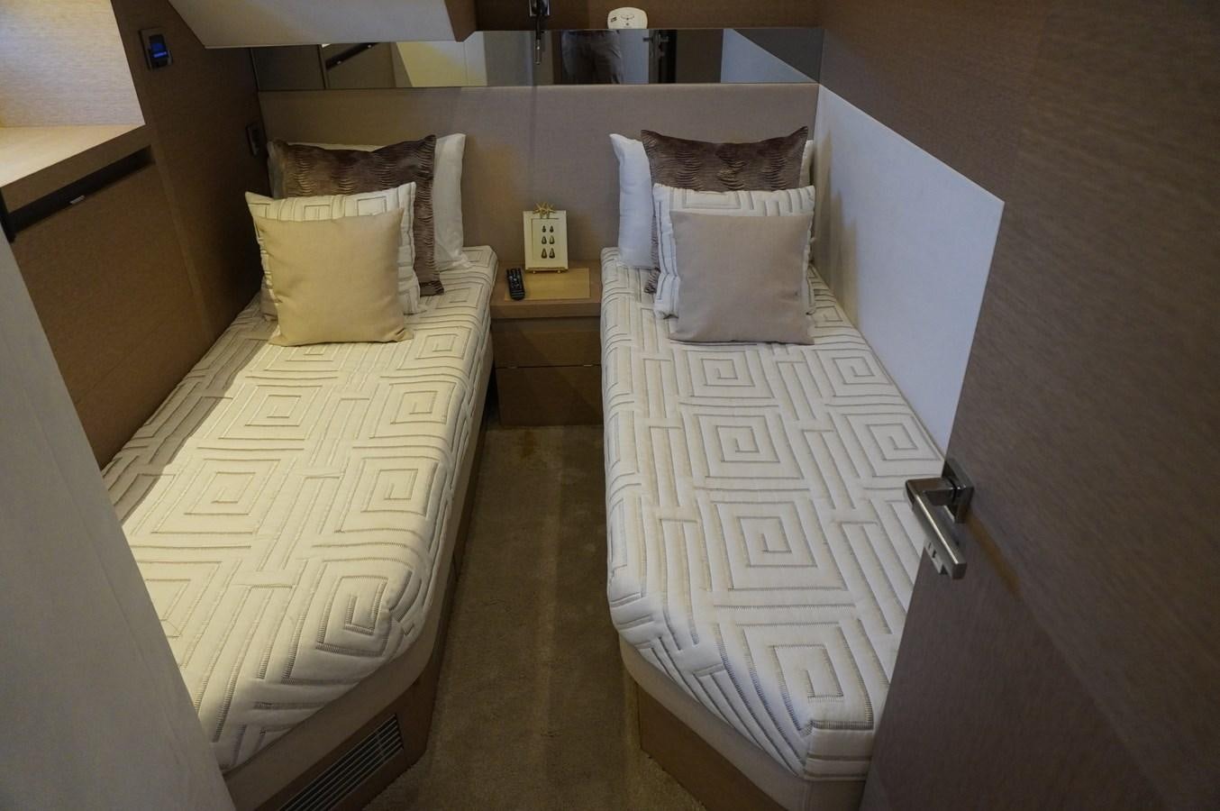 a bed with white sheets aboard 2017 PRESTIGE 680  Yacht for Sale