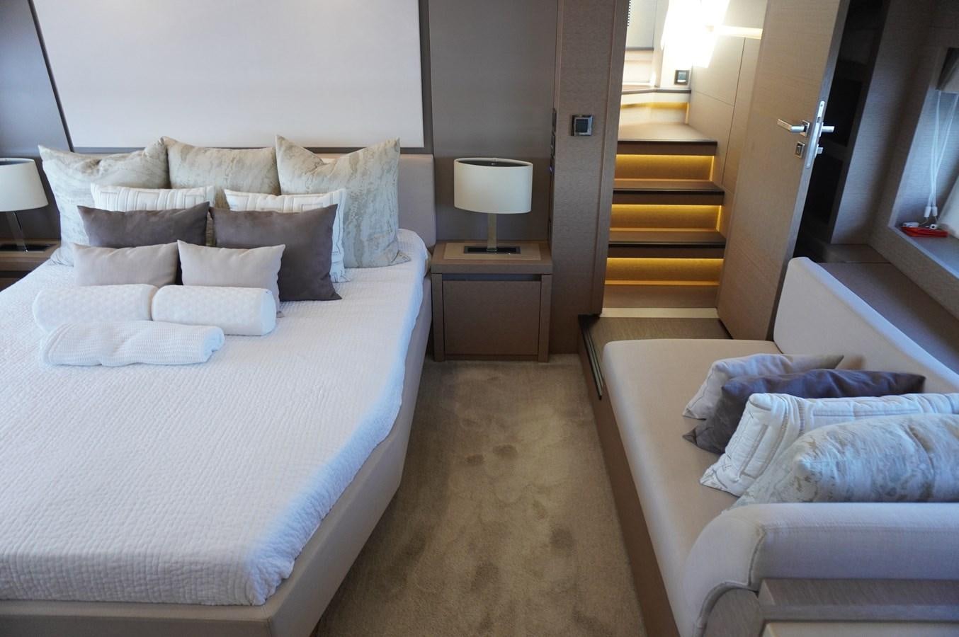 a room with a bed and a television aboard 2017 PRESTIGE 680  Yacht for Sale