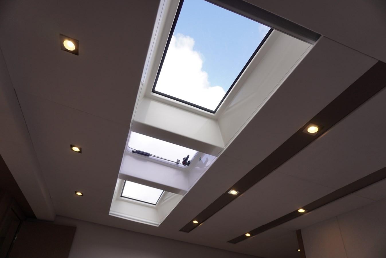 a white ceiling with a window aboard 2017 PRESTIGE 680  Yacht for Sale