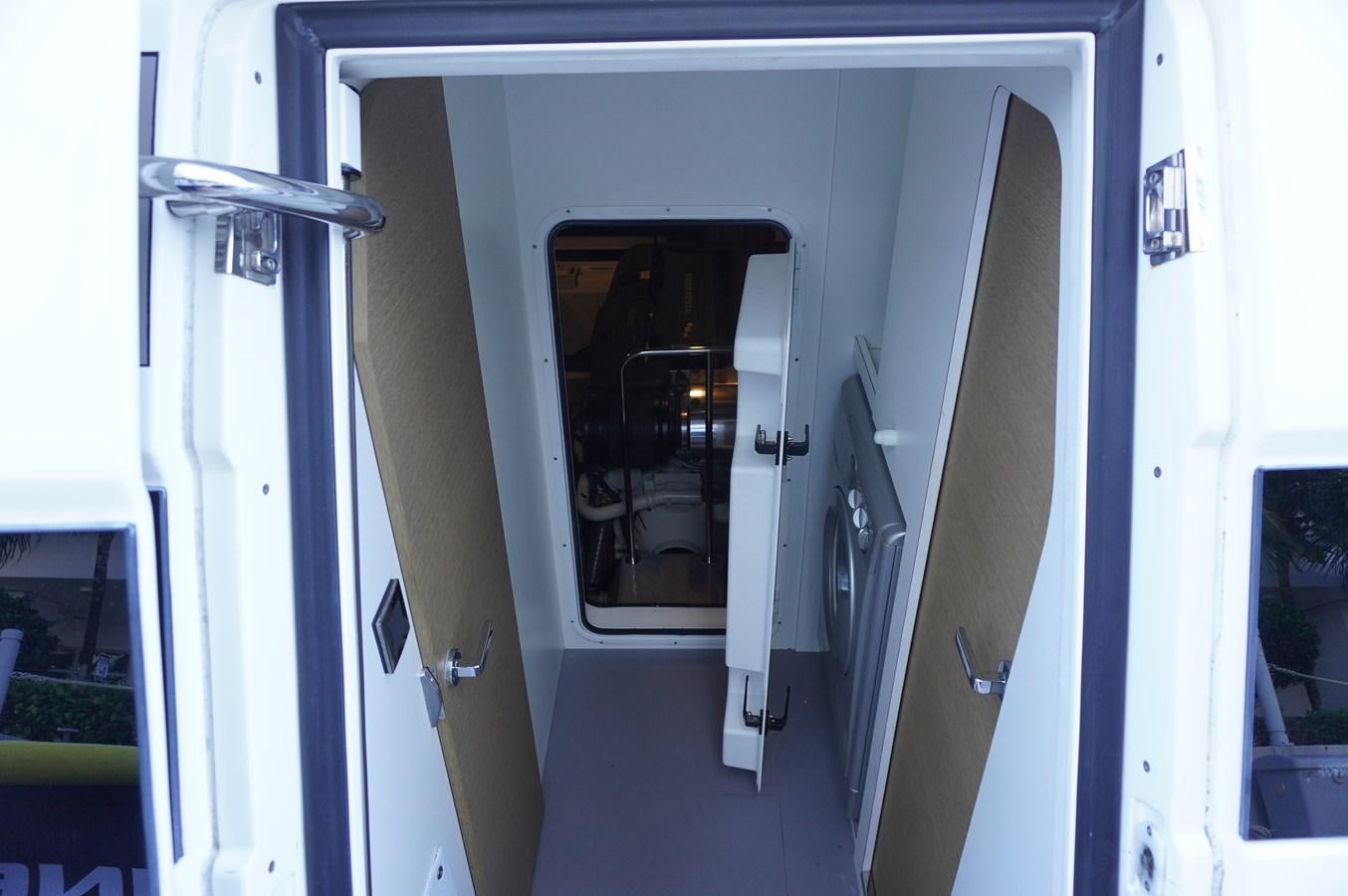 a door open with a window aboard 2017 PRESTIGE 680  Yacht for Sale