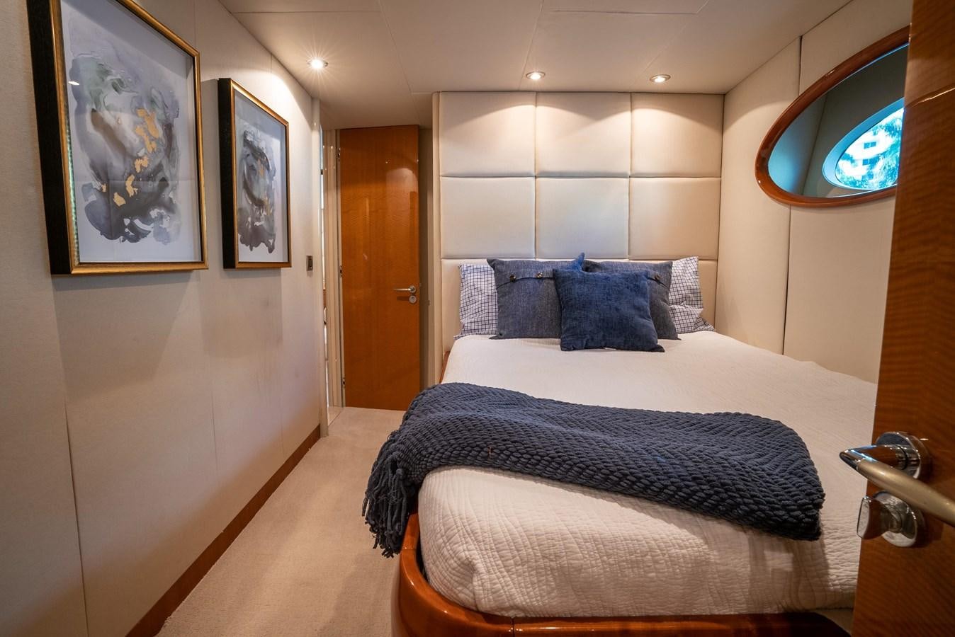 a room with two beds aboard COMPROMISE Yacht for Sale