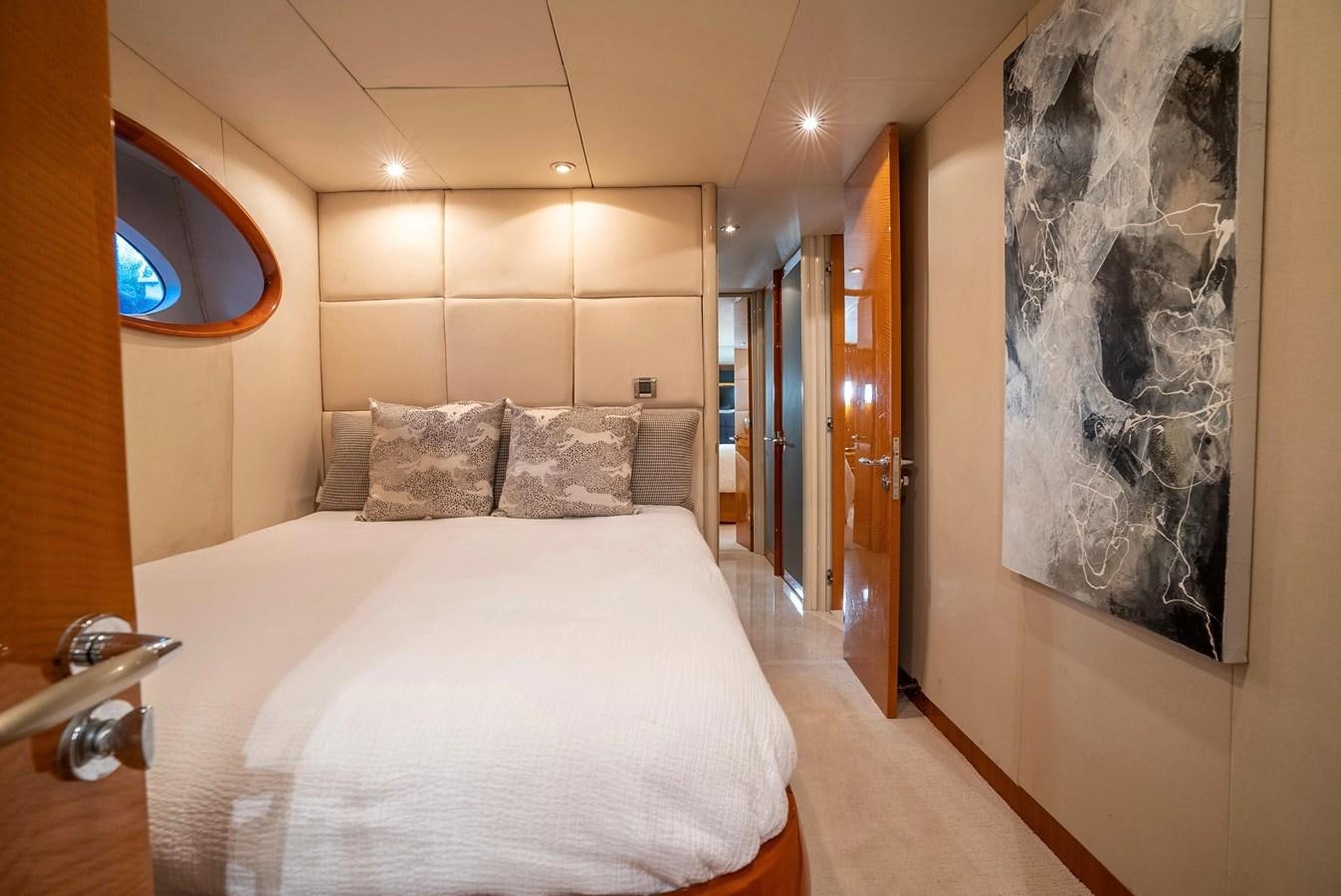 a bed in a room aboard COMPROMISE Yacht for Sale