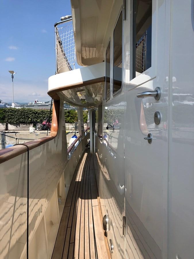 a large white boat on a dock aboard ORION  Yacht for Sale