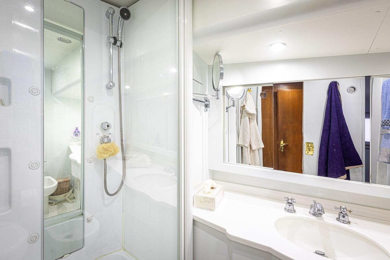 a bathroom with a shower and sink aboard ORION  Yacht for Sale