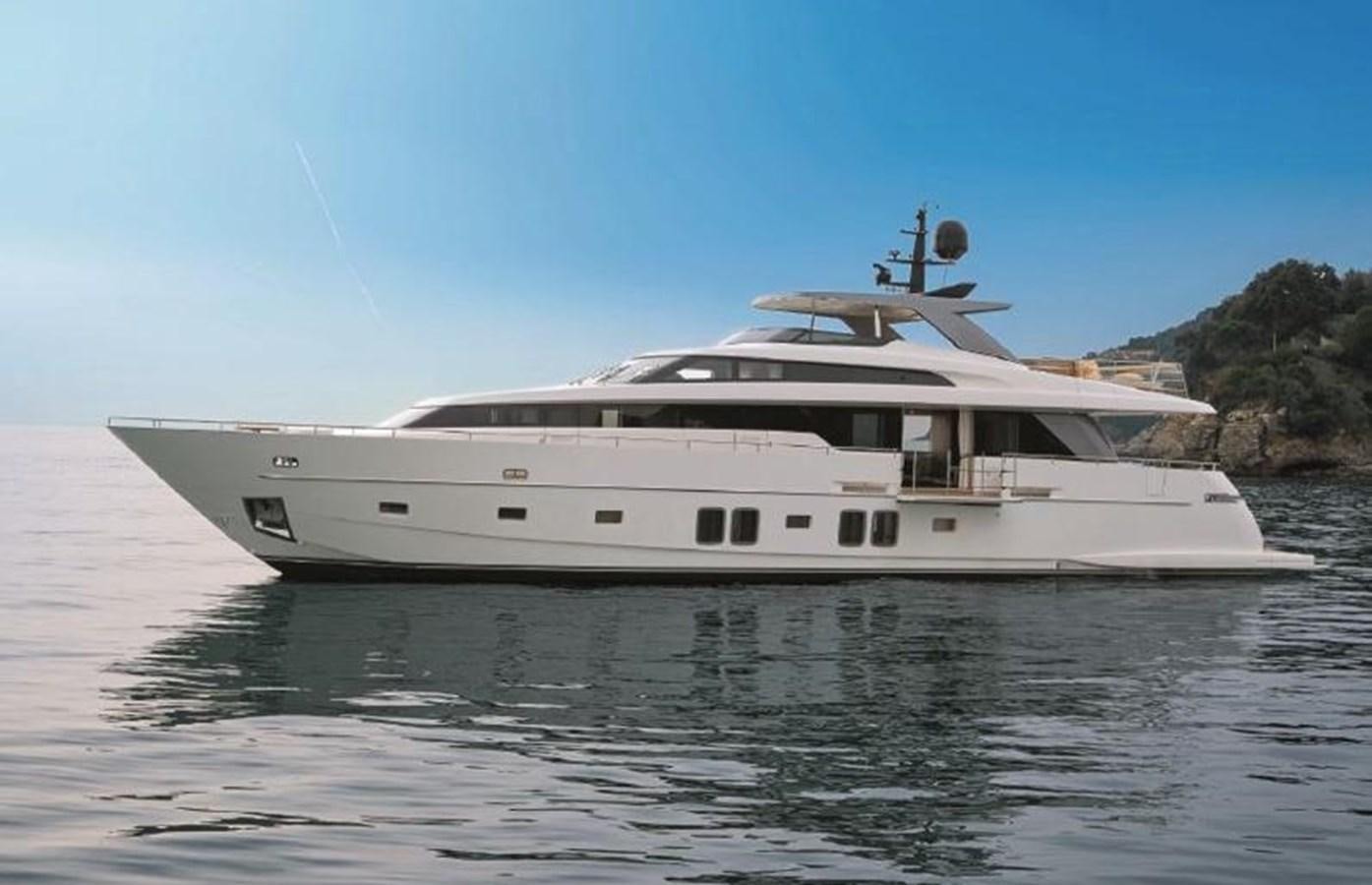 a white yacht on the water aboard MUMA Yacht for Sale