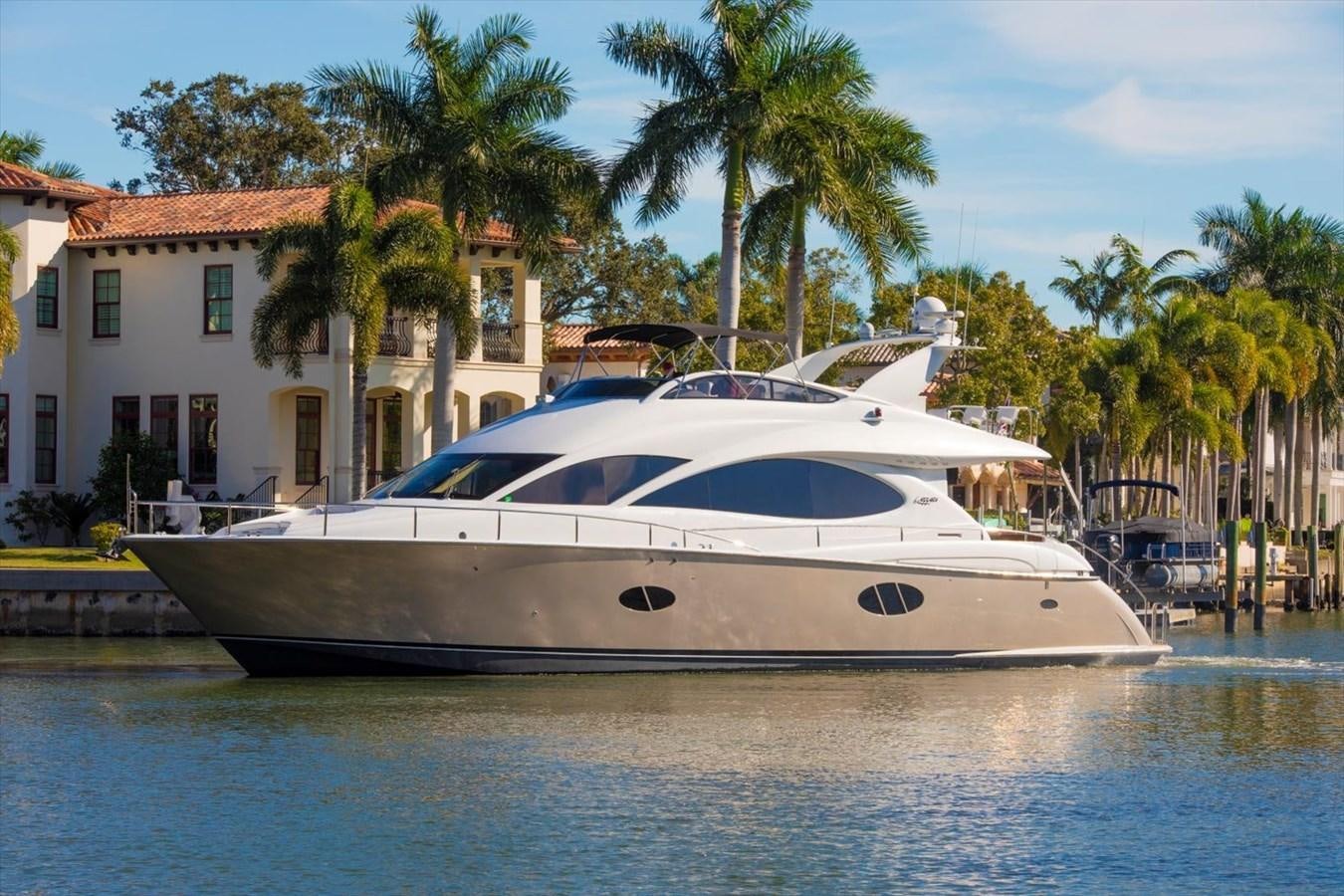 a white yacht in a tropical setting aboard GOLDEN LADY Yacht for Sale