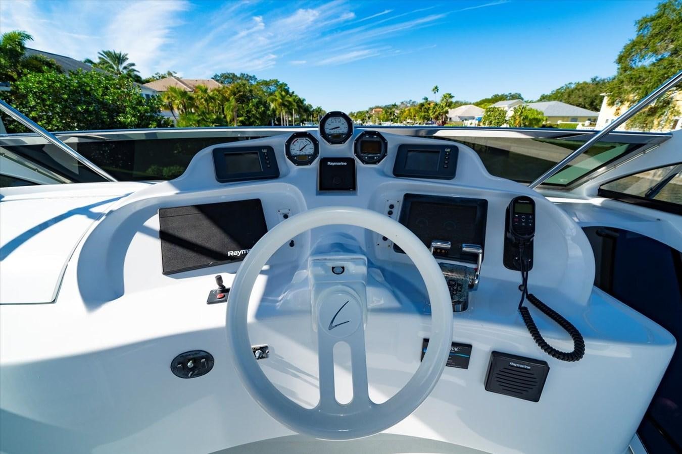 the inside of a white car aboard GOLDEN LADY Yacht for Sale