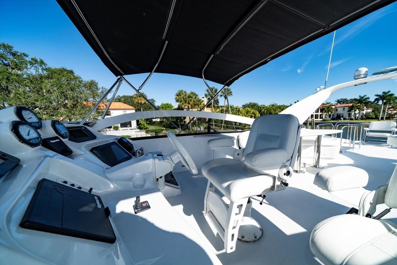 a group of white cars parked in a row aboard GOLDEN LADY Yacht for Sale