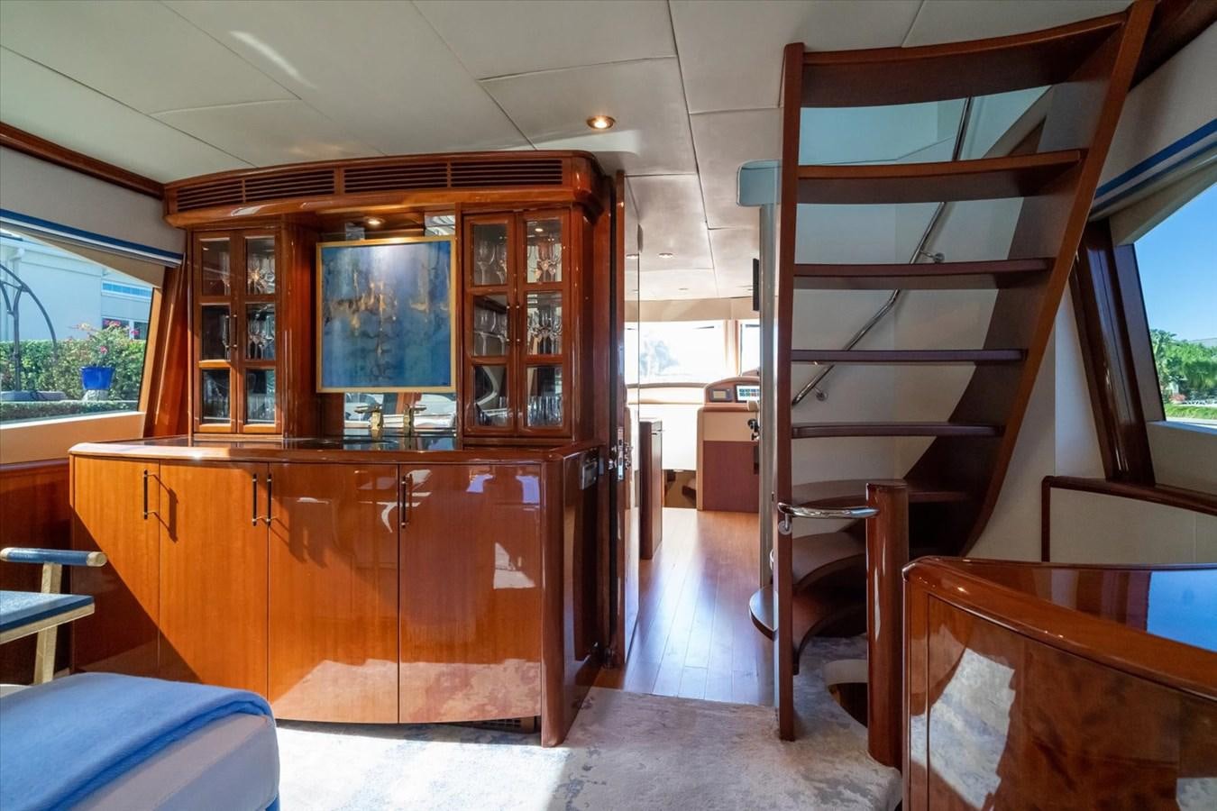 a wooden bunk bed in a room aboard GOLDEN LADY Yacht for Sale
