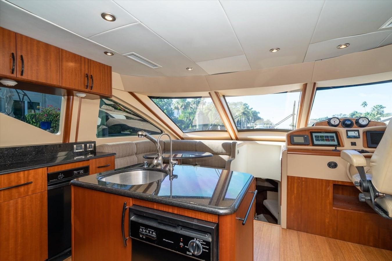 a kitchen with a sink and cabinets aboard GOLDEN LADY Yacht for Sale