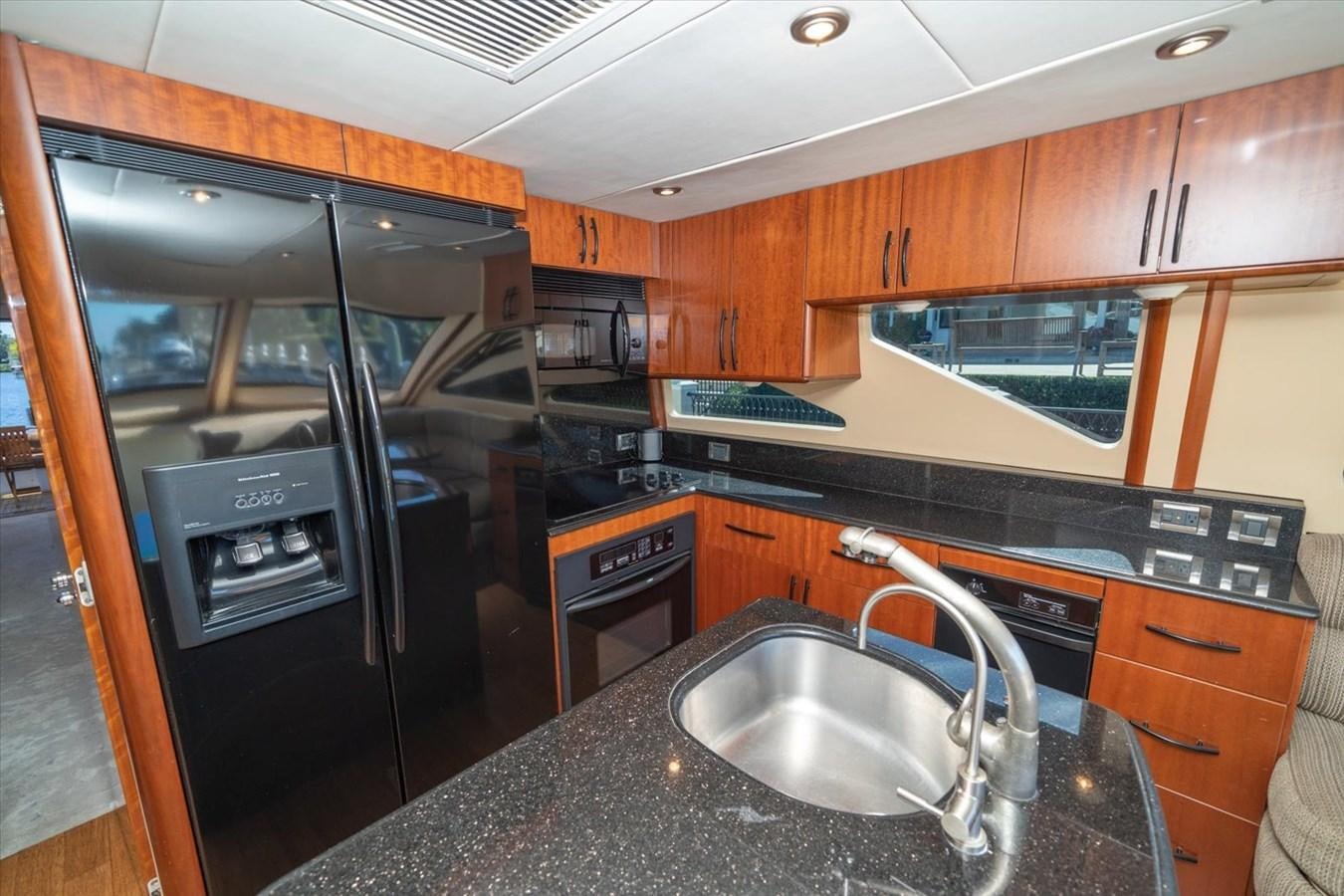 a kitchen with a stainless steel sink aboard GOLDEN LADY Yacht for Sale