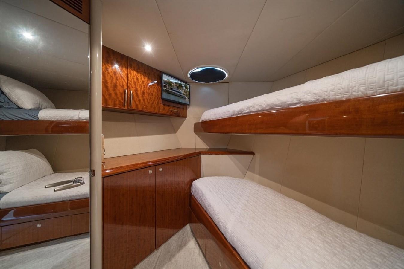 a room with bunk beds aboard GOLDEN LADY Yacht for Sale