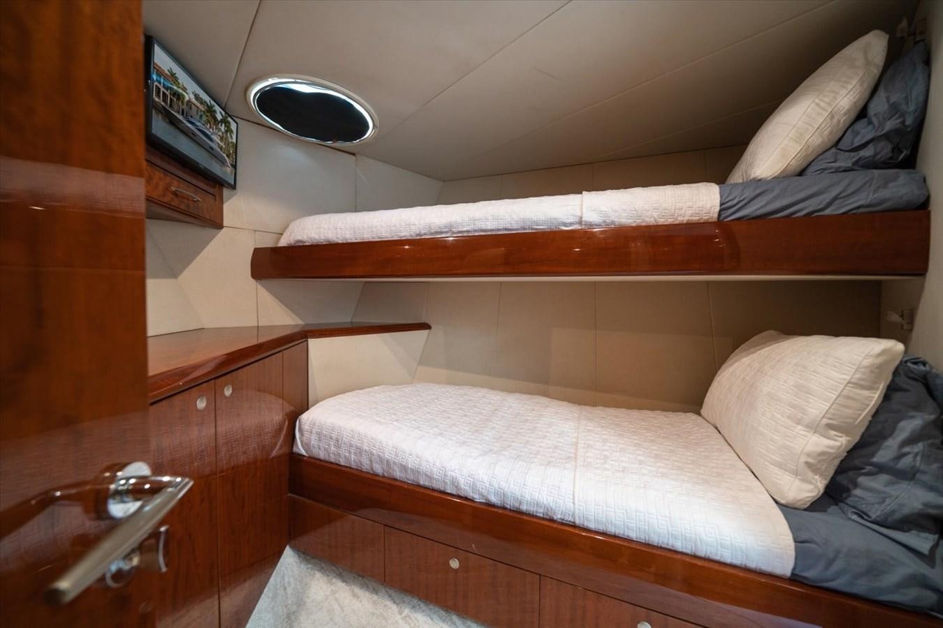 a bed with a white sheet aboard GOLDEN LADY Yacht for Sale