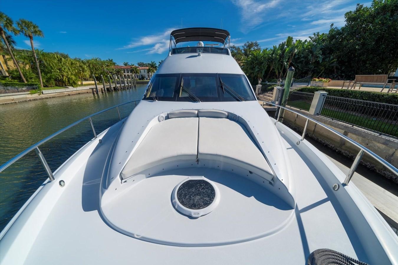 a white boat on a body of water aboard GOLDEN LADY Yacht for Sale