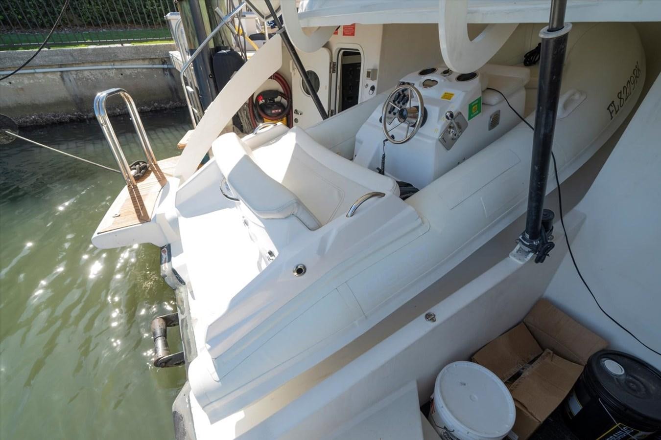 a white machine with a black handle aboard GOLDEN LADY Yacht for Sale