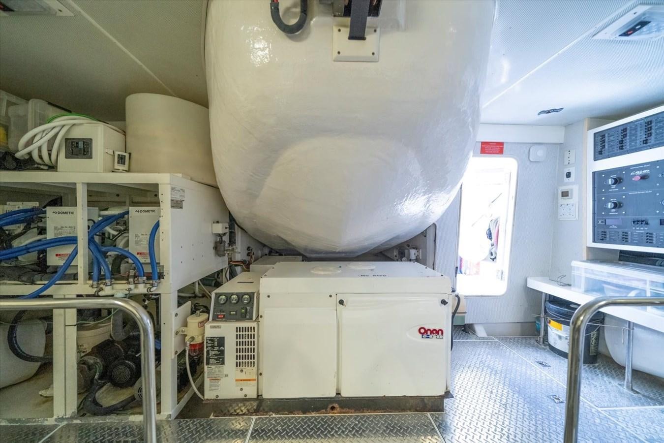 a large white machine in a room aboard GOLDEN LADY Yacht for Sale