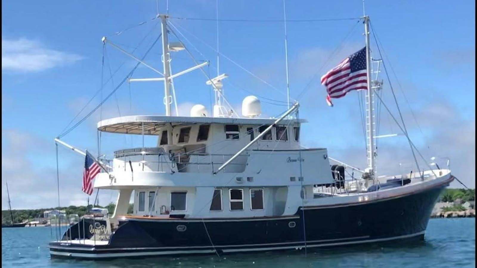 a large boat on the water aboard BONNE VIE Yacht for Sale