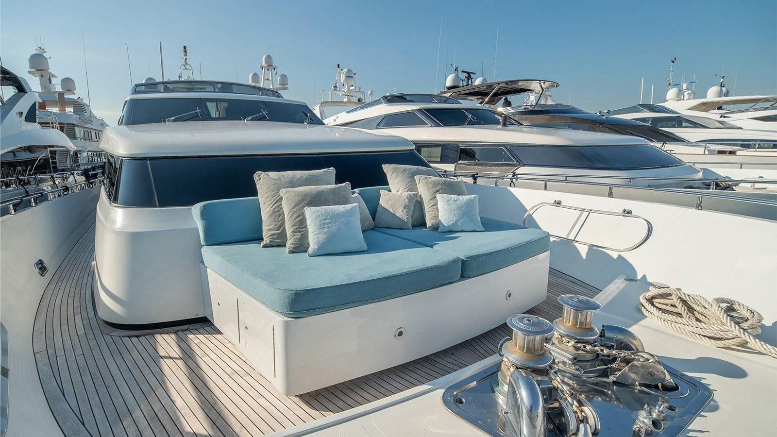 a large white boat with pillows on it aboard DIAMARE Yacht for Sale