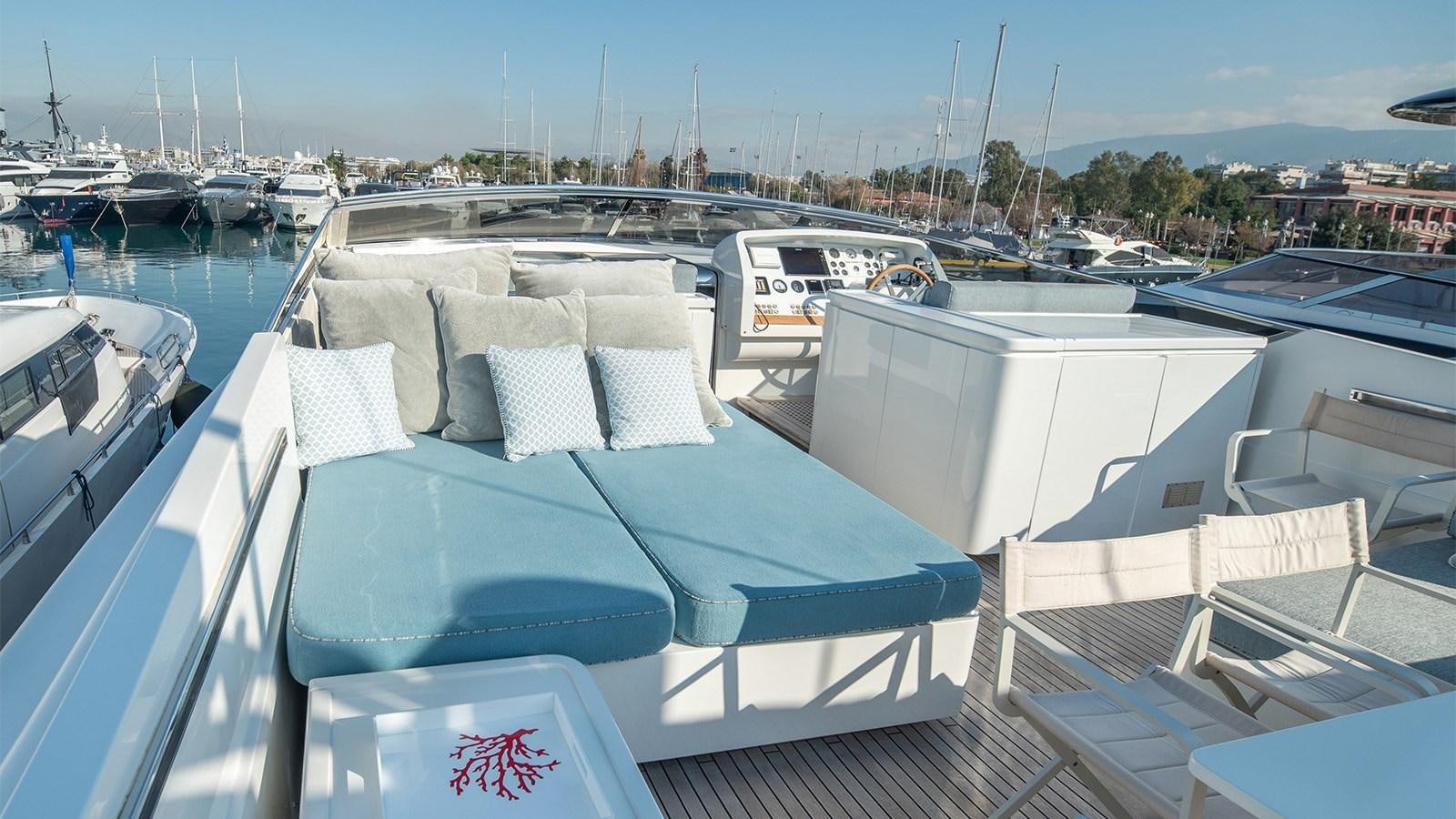 a group of boats sit on a dock aboard DIAMARE Yacht for Sale