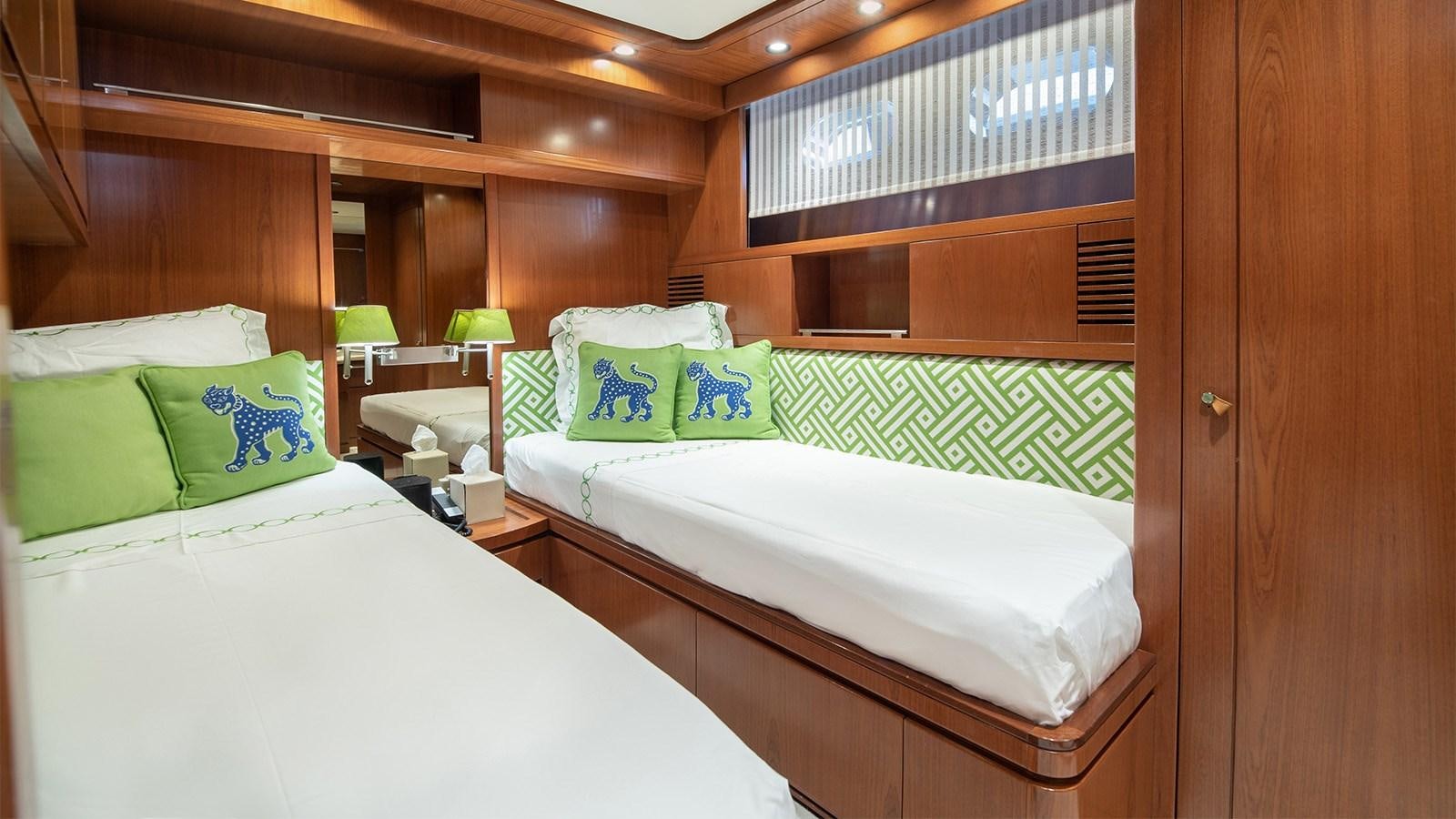 a couple of beds in a room aboard DIAMARE Yacht for Sale