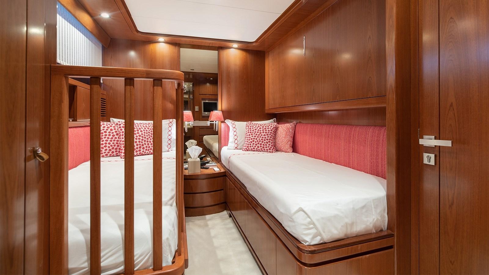 a couple of beds in a room aboard DIAMARE Yacht for Sale