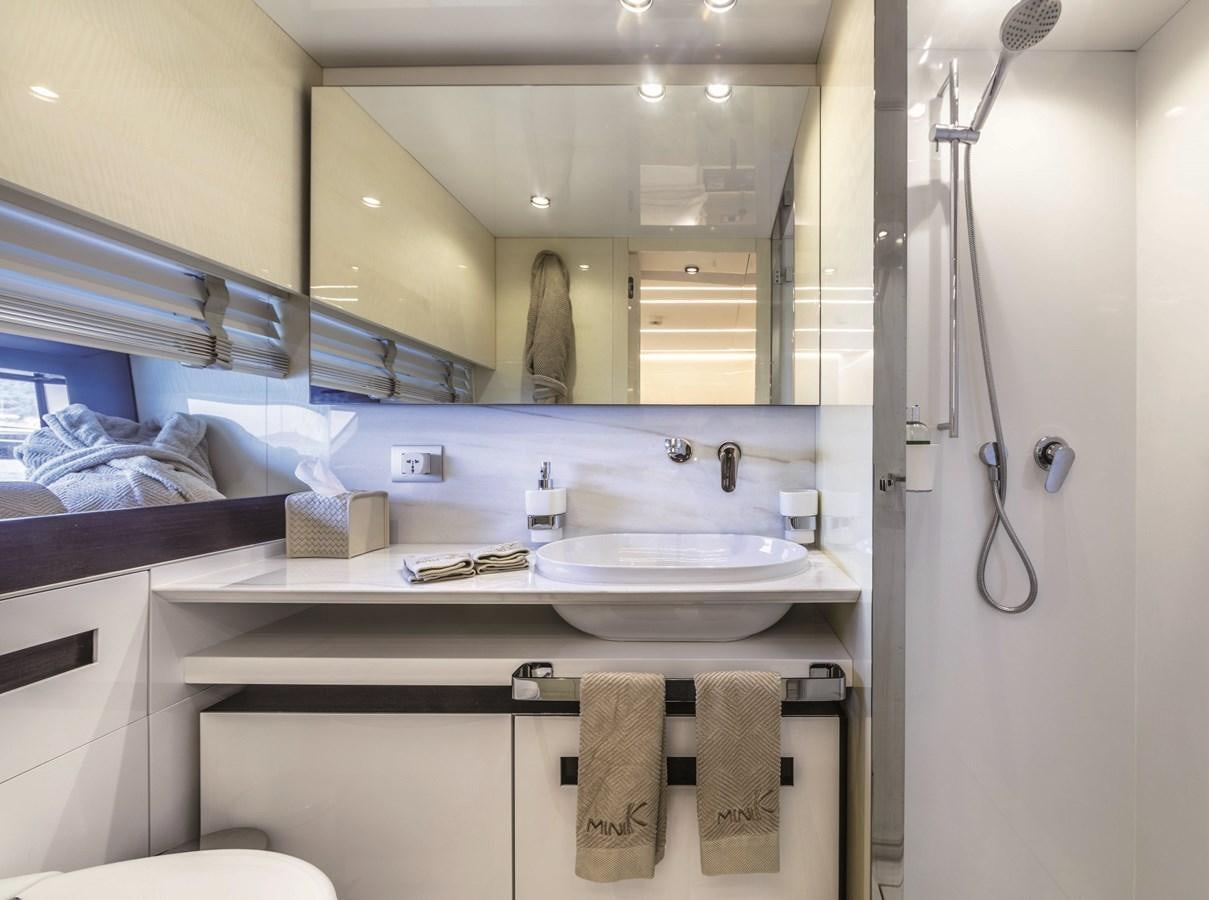 a bathroom with a large mirror aboard SONEY Yacht for Sale