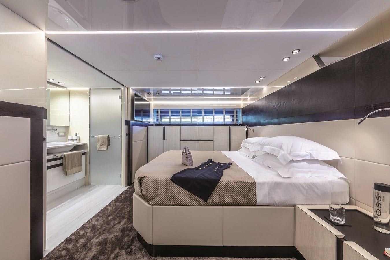 a room with a bed and a window aboard SONEY Yacht for Sale