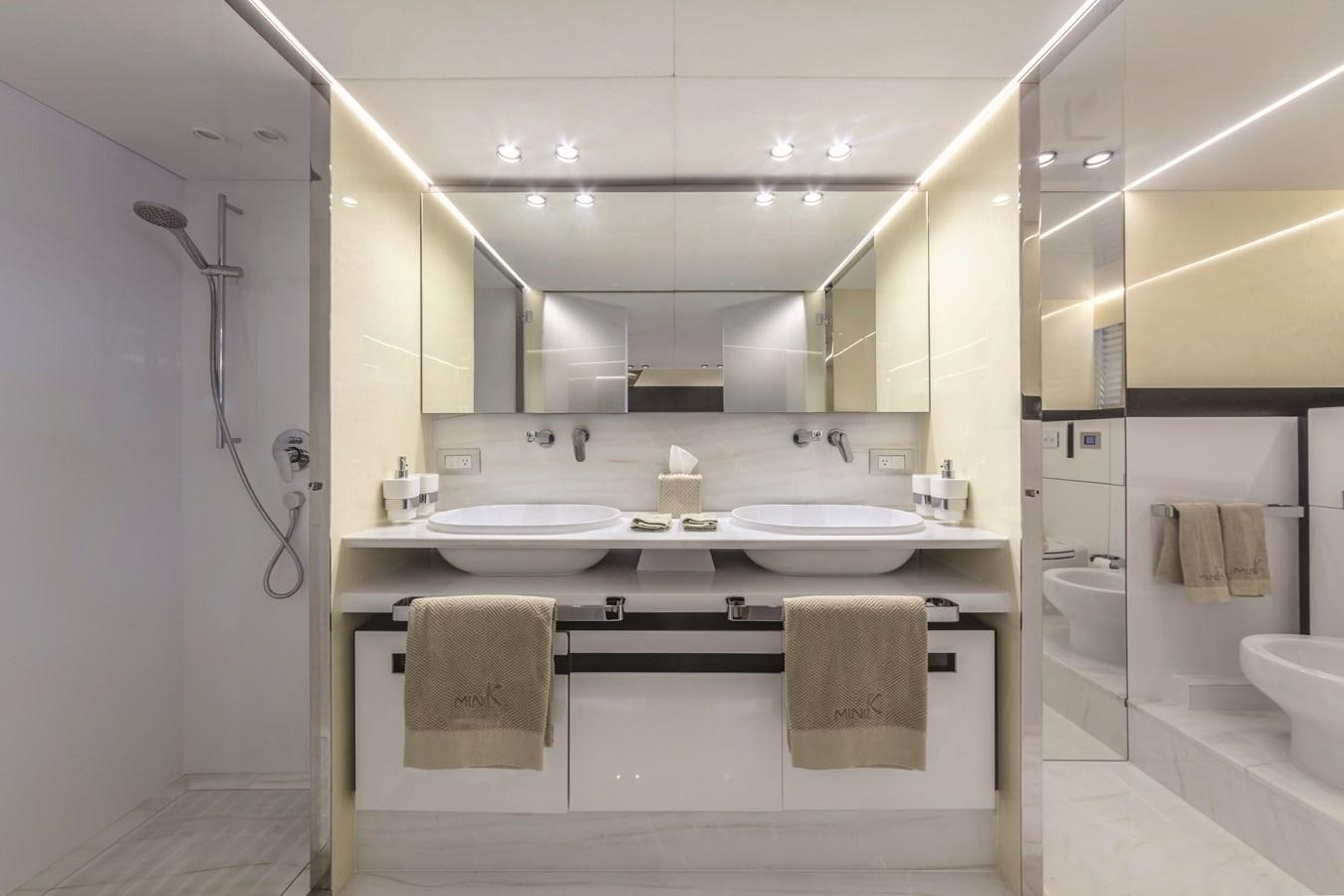 a bathroom with a sink and a mirror aboard SONEY Yacht for Sale