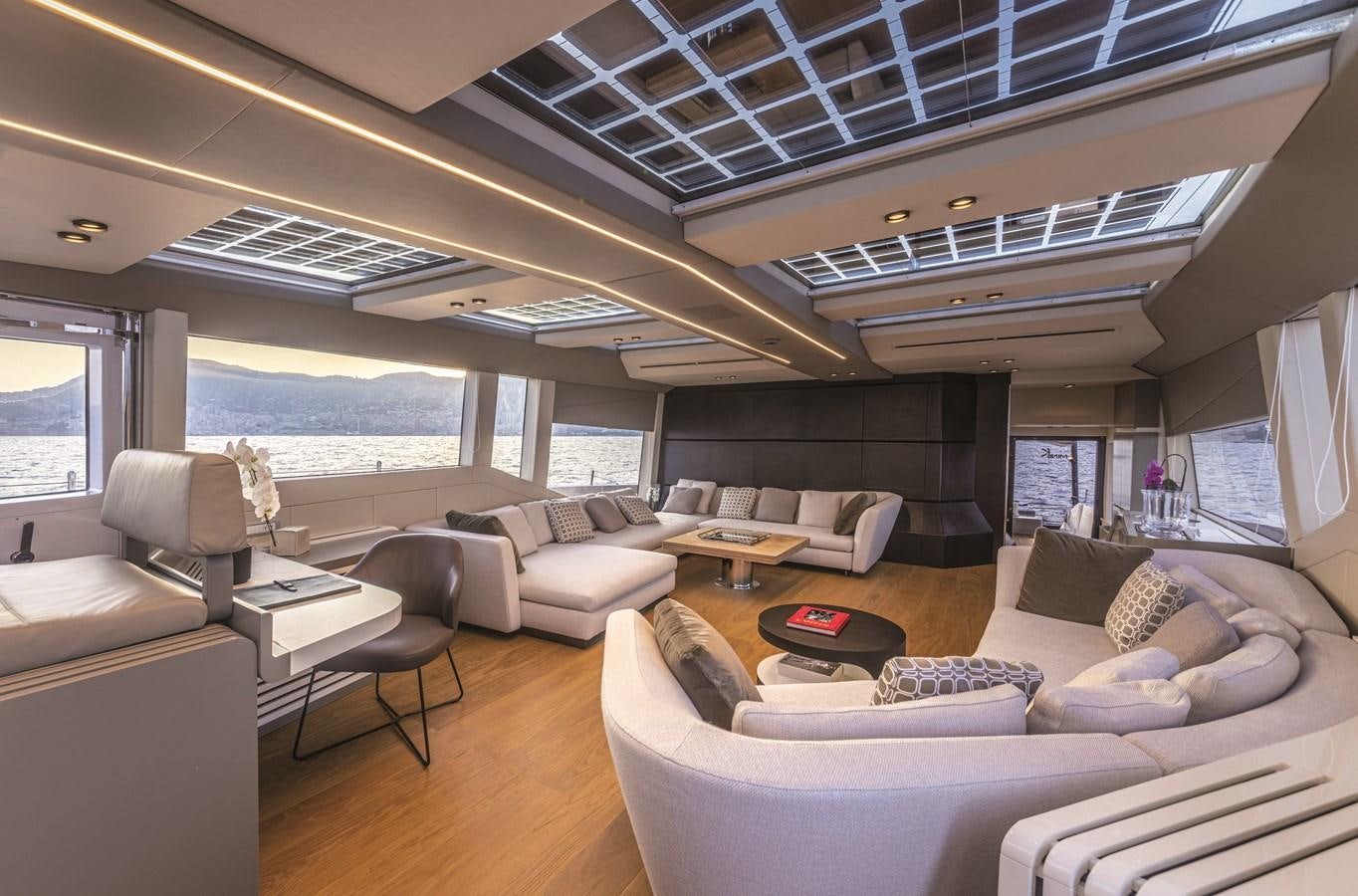 a room with a large window and a view of the ocean aboard SONEY Yacht for Sale