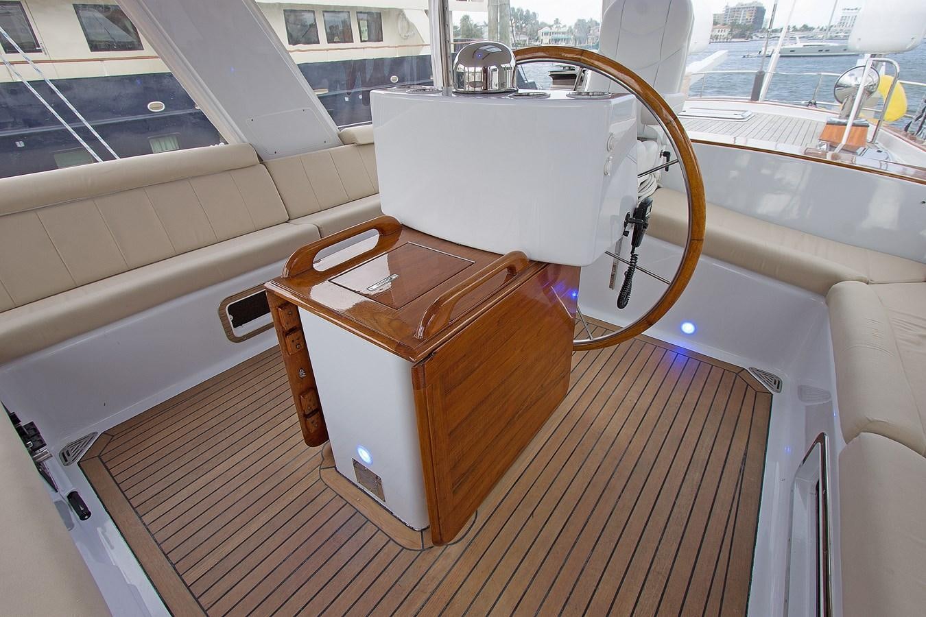 a white sewing machine on a wooden surface aboard EAGLES NEST Yacht for Sale