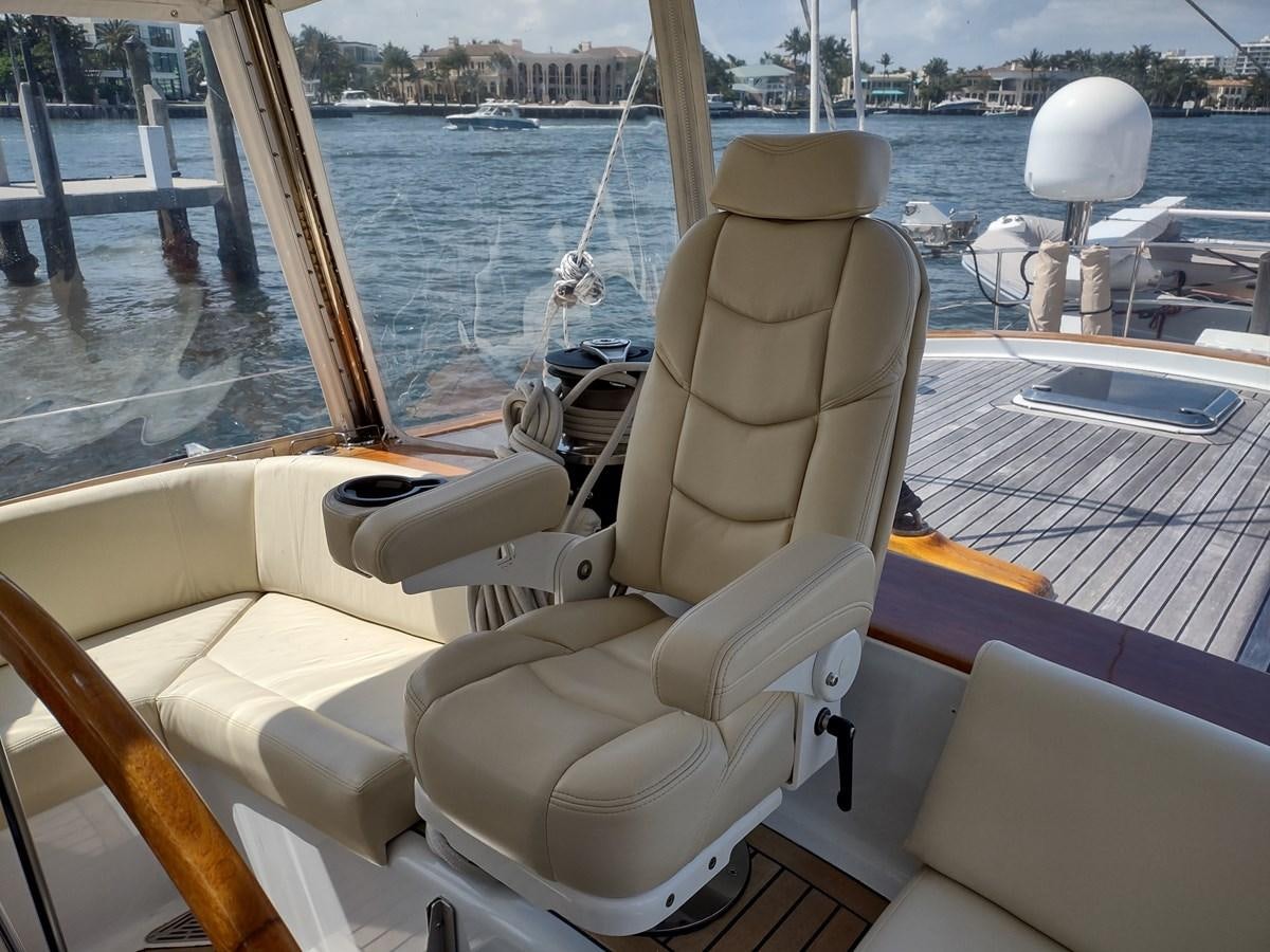 a boat with a chair on it aboard EAGLES NEST Yacht for Sale