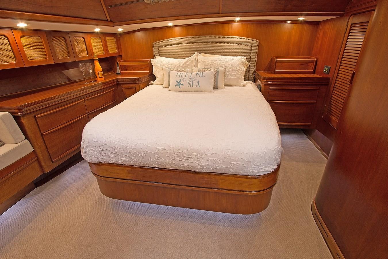 a bed in a room aboard EAGLES NEST Yacht for Sale