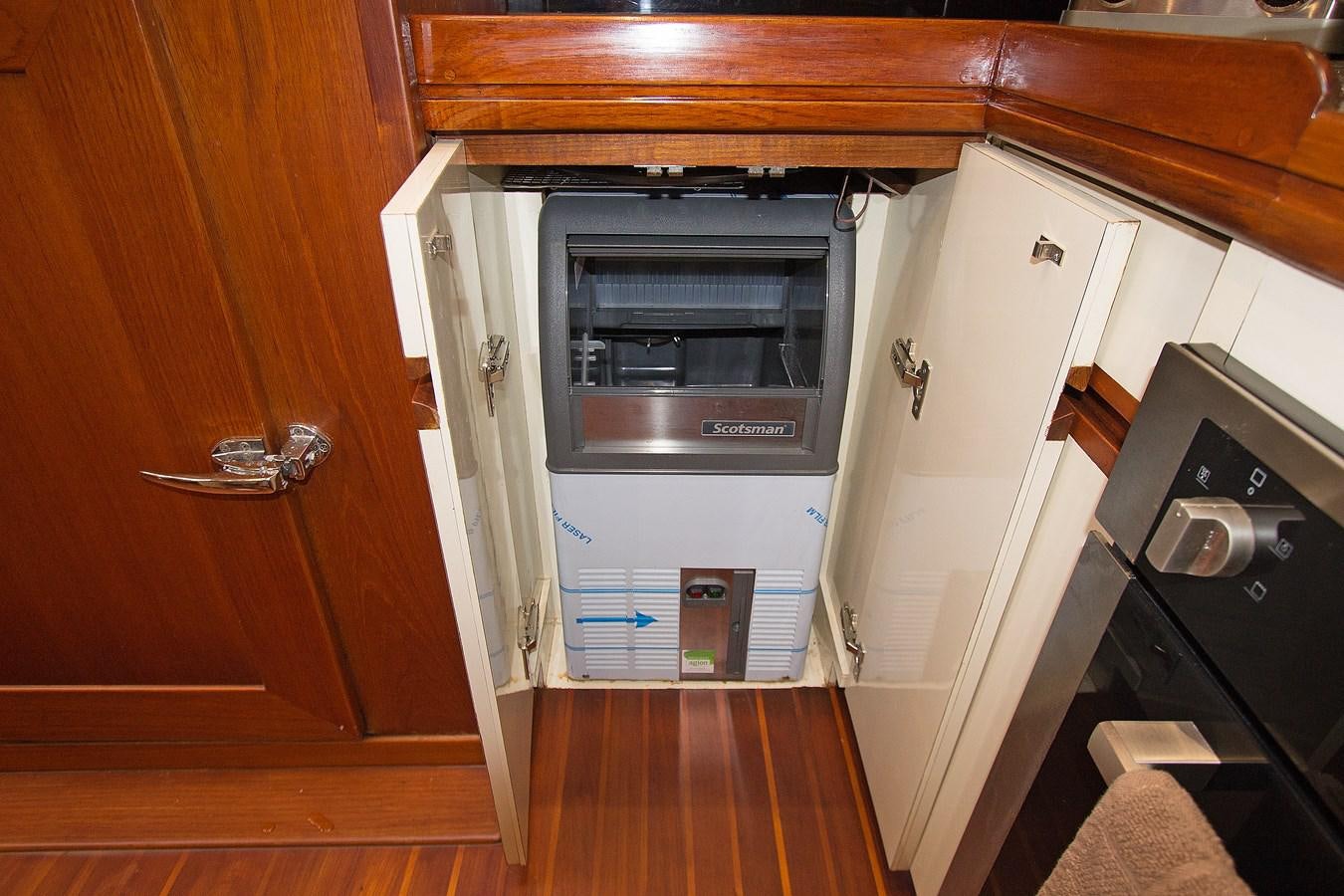 a kitchen with a microwave oven aboard EAGLES NEST Yacht for Sale