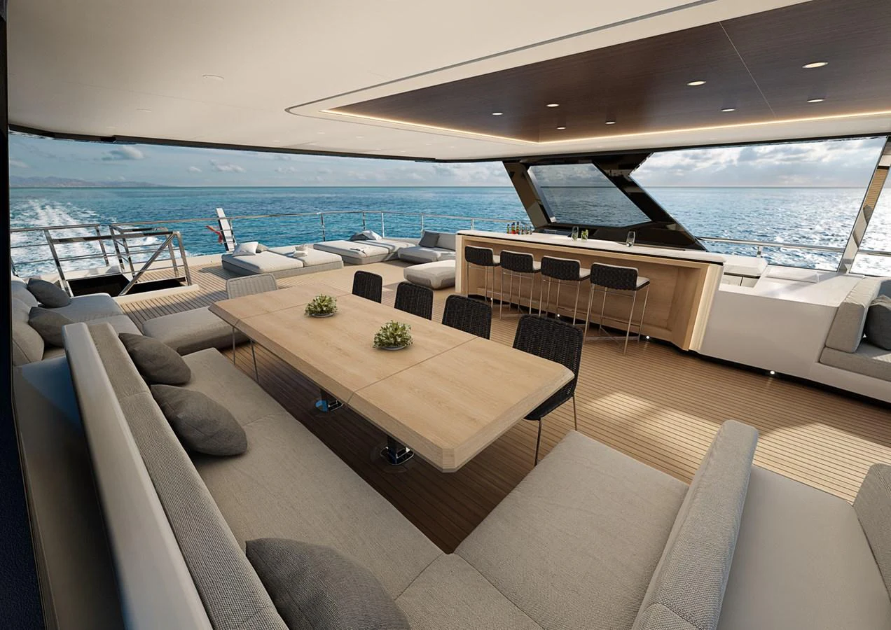 a room with a couch and a table and chairs aboard COLUMBUS CROSSOVER 42/01 Yacht for Sale