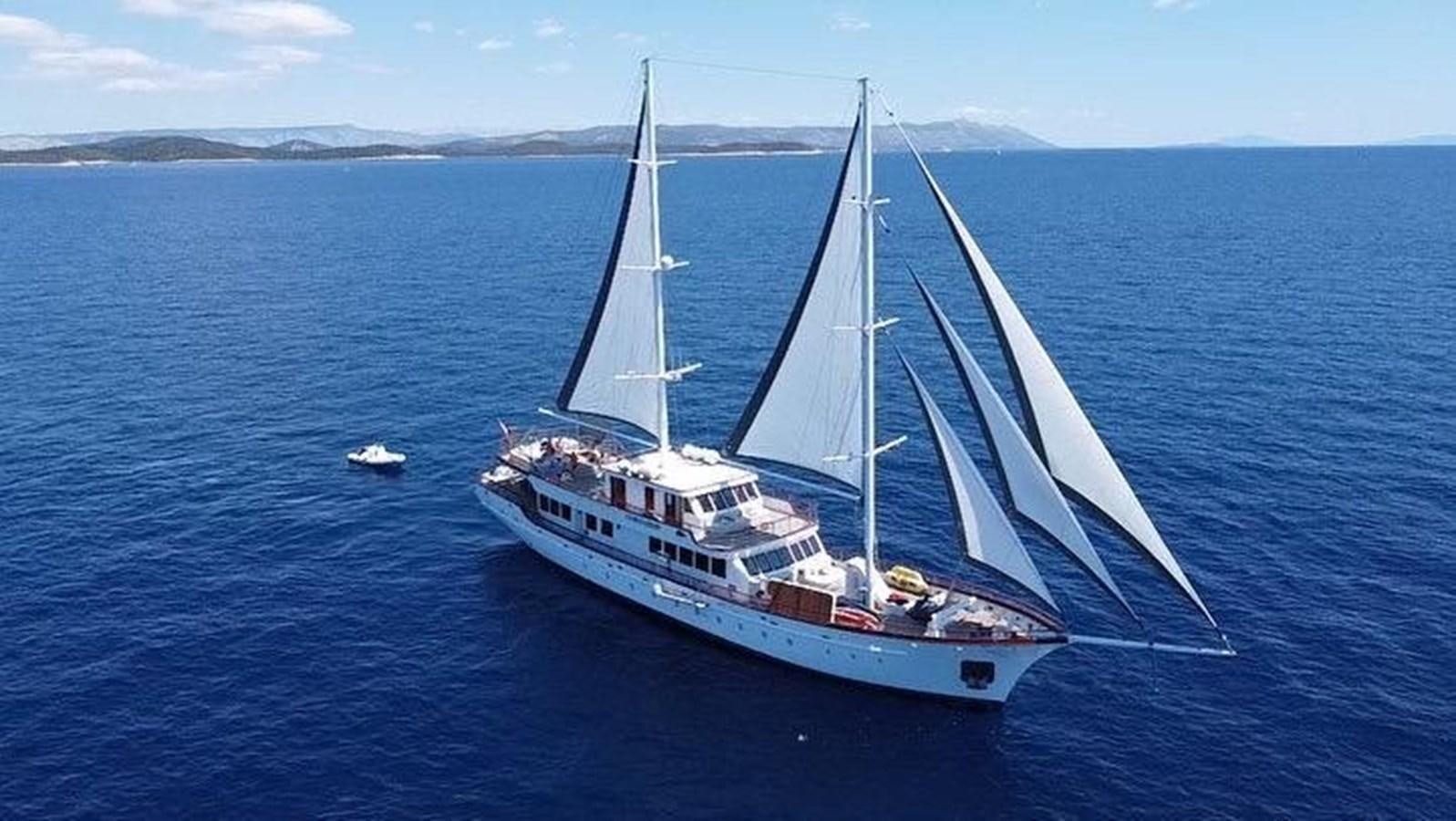 a boat sailing in the sea aboard CORSARIO Yacht for Charter