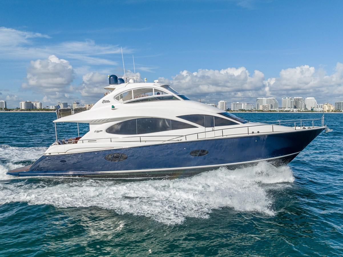a white yacht on the water aboard EDITA  Yacht for Sale