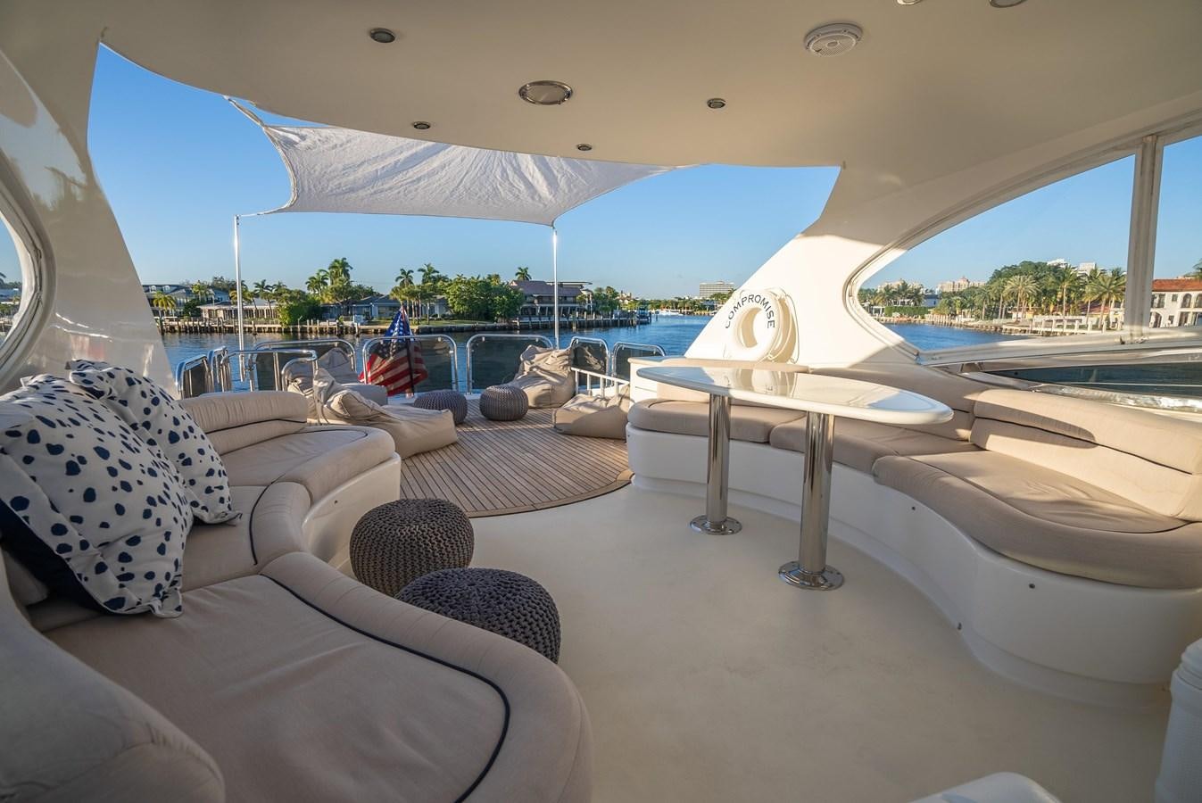 a room with a table and chairs aboard EDITA  Yacht for Sale
