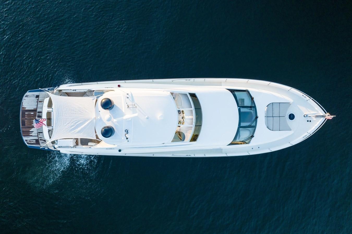 a white ship in the water aboard EDITA  Yacht for Sale