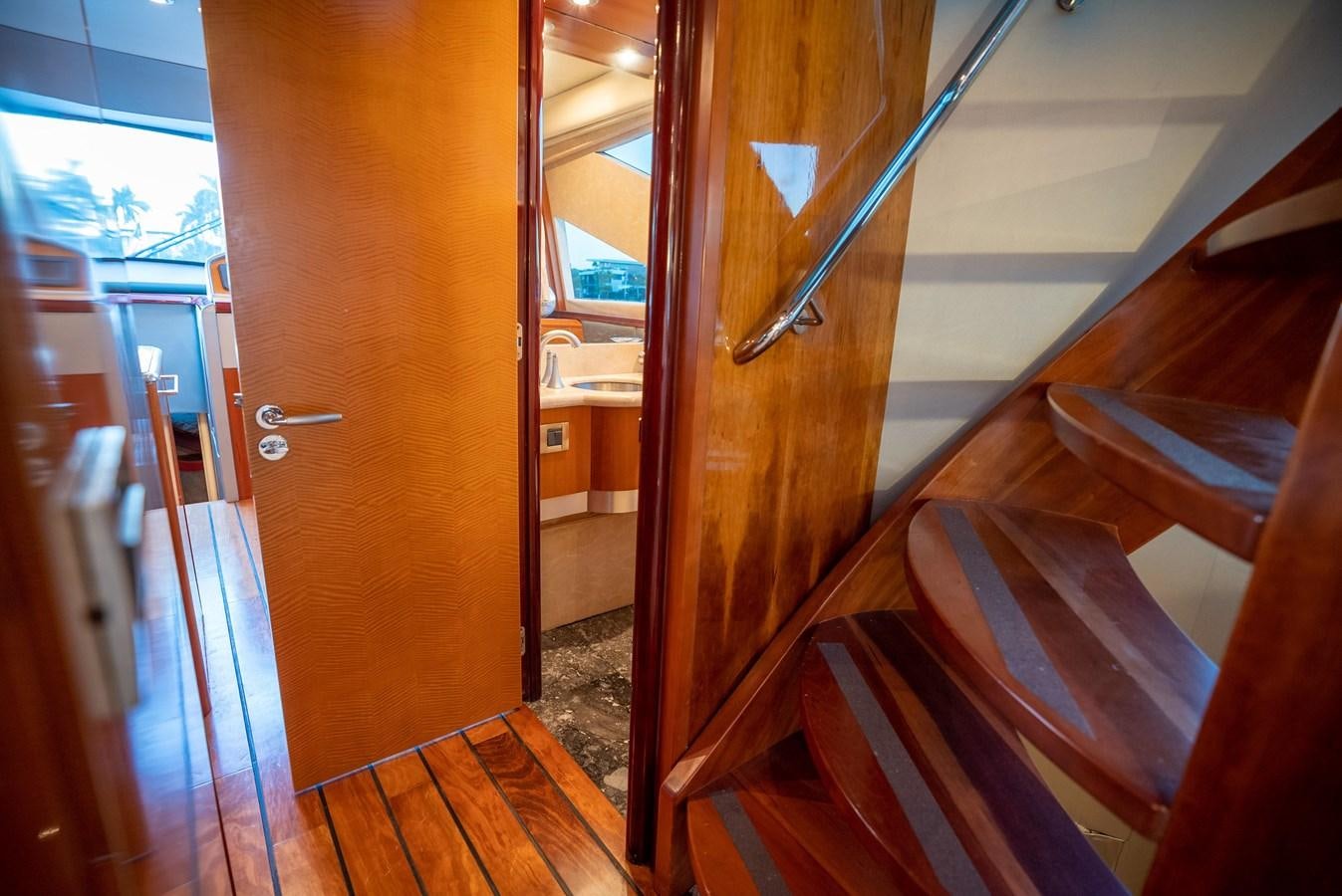 a wood deck with wood railings aboard EDITA  Yacht for Sale